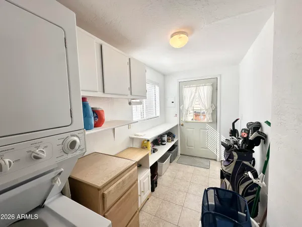 a living room with a couch and a window