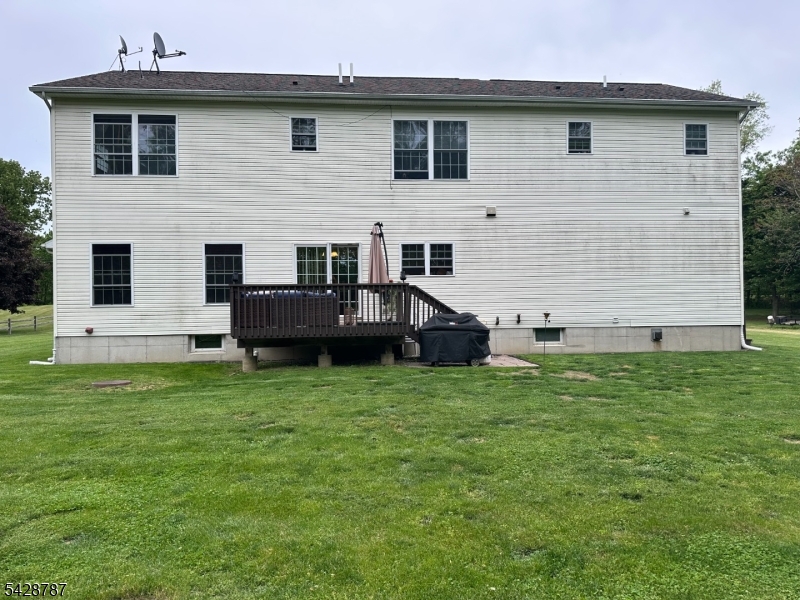 70 Holland Road Wantage, NJ 07461 - Photo 34 of 35 a view of a house with a backyard