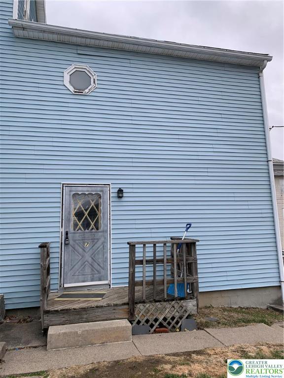 210 West Main Street Pen Argyl, PA 18072 - Photo 4 of 21 a view of a house with wooden door