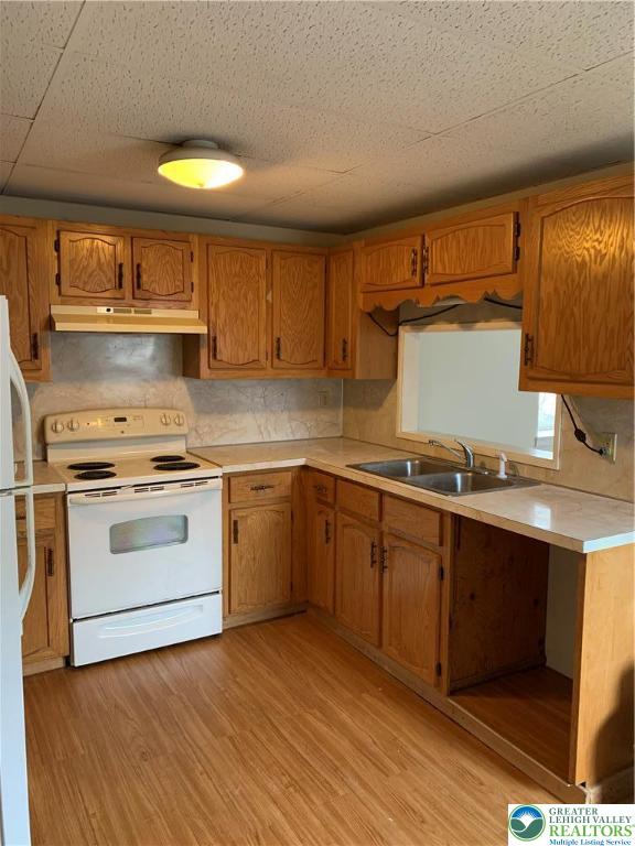 210 West Main Street Pen Argyl, PA 18072 - Photo 6 of 21 a kitchen with a stove cabinets and a sink