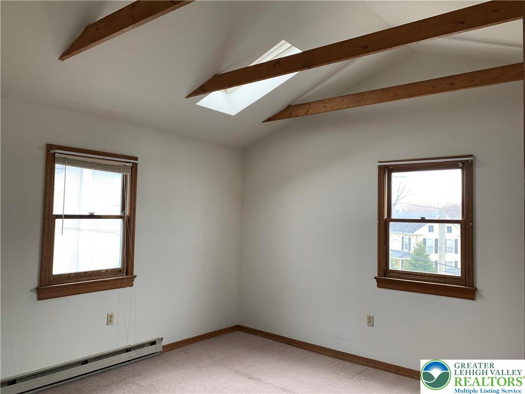 210 West Main Street Pen Argyl, PA 18072 - Photo 9 of 21 a view of an empty room with a window