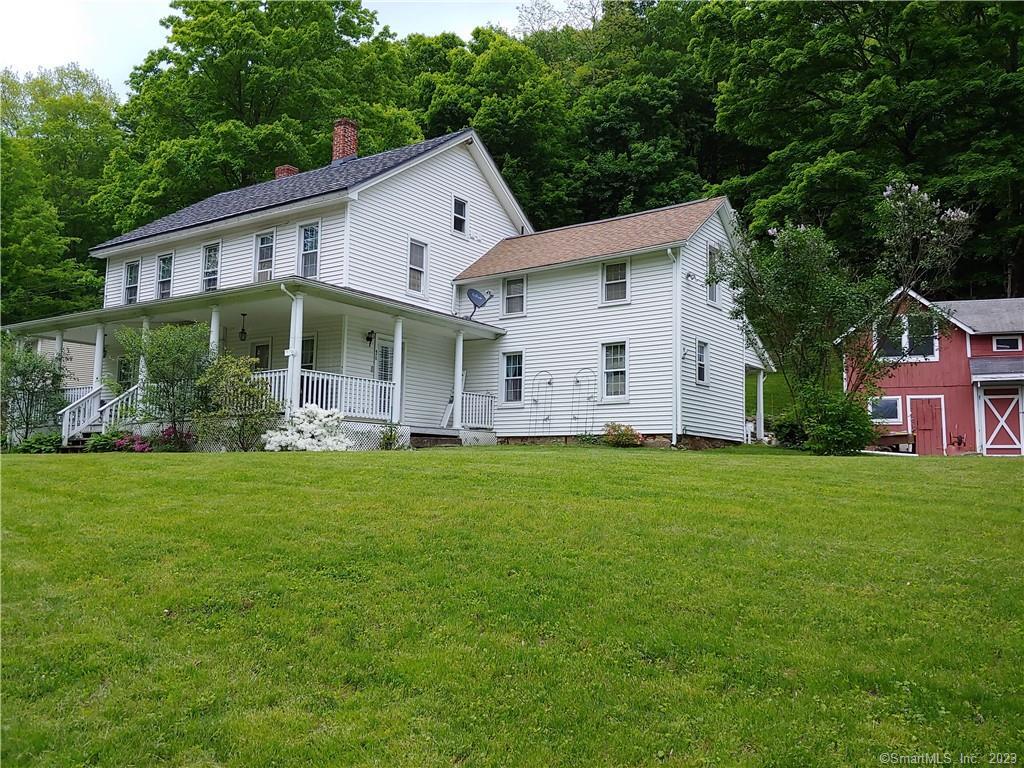 47 Maple St Extension Kent, CT 06757 - Photo 1 of 1 a view of a house with backyard and garden