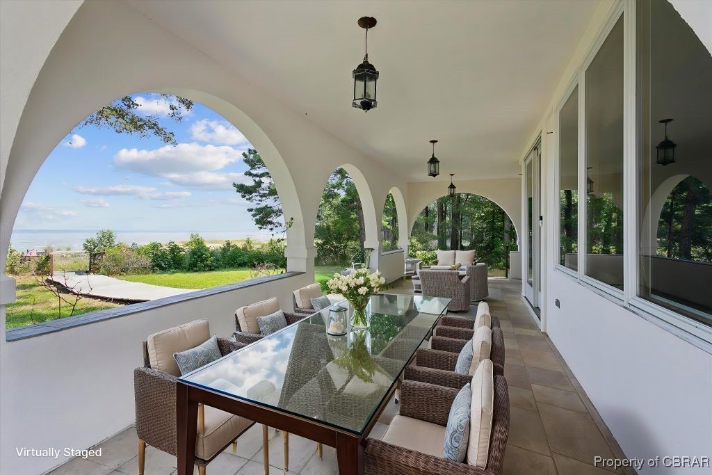 188 Tranquility Road Reedville, VA 22539 - Photo 3 of 50 Feel the breeze as you relax on the deep covered porch