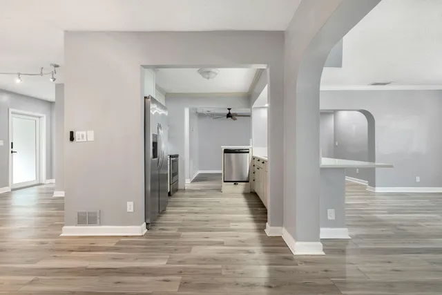 a view of a bathroom from the hallway