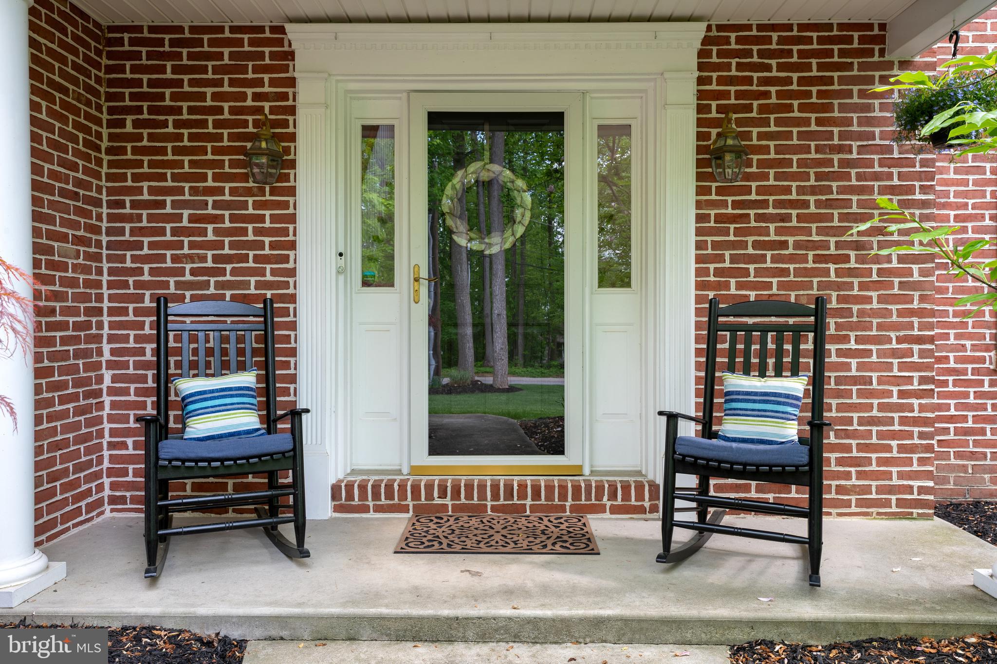 1156 Siddonsburg Road Mechanicsburg, PA 17055 - Photo 5 of 58 a bench sitting in front of a door