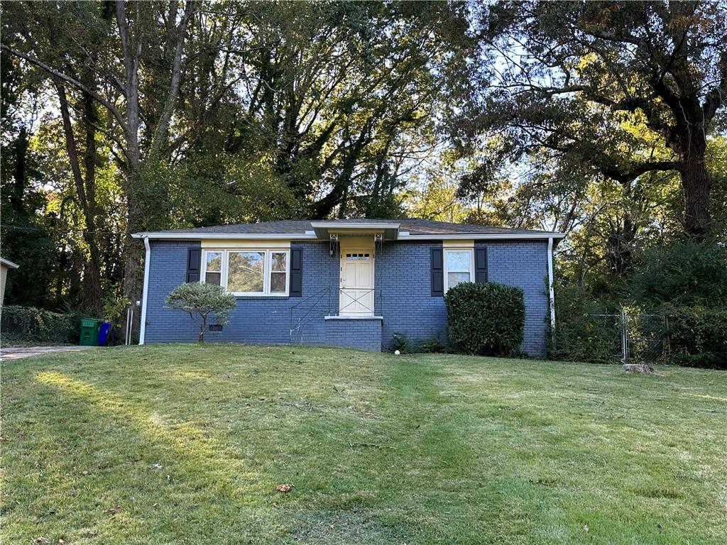 1421 Cobb Branch Drive Decatur, GA 30032 - Photo 1 of 1 a view of a house with a yard