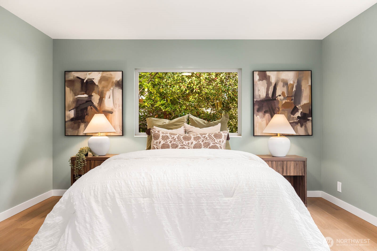 19425 Hollyhills Drive Northeast Bothell, WA 98011 - Photo 15 of 26 a bedroom with a large bed and a window