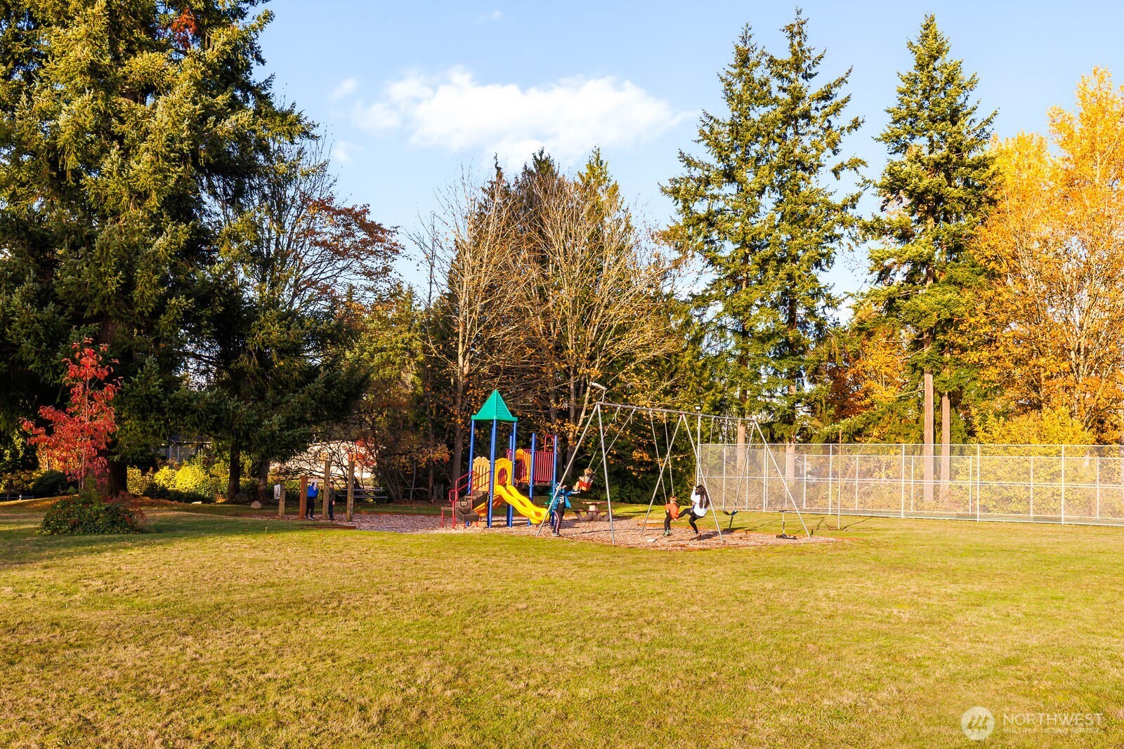19425 Hollyhills Drive Northeast Bothell, WA 98011 - Photo 25 of 26 a view of a swimming pool with an outdoor space and seating area