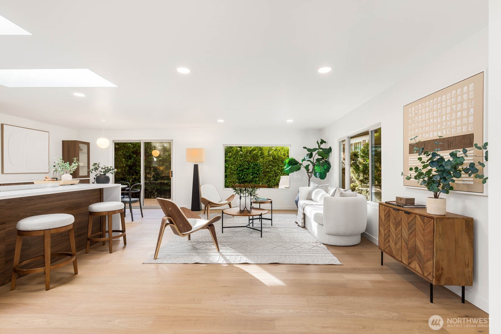 19425 Hollyhills Drive Northeast Bothell, WA 98011 - Photo 5 of 26 a living room with furniture and a large window