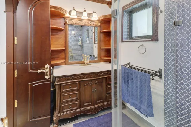 a bathroom with a toilet a sink and shower