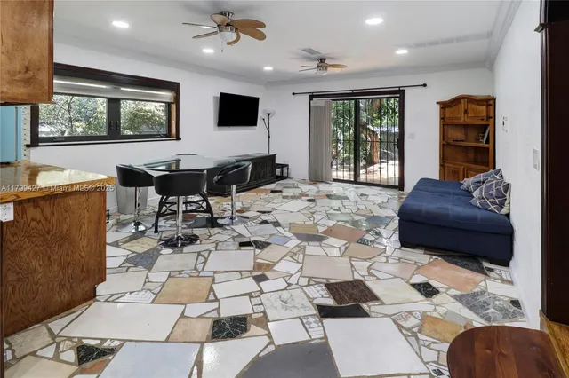 a house with tree in front of it