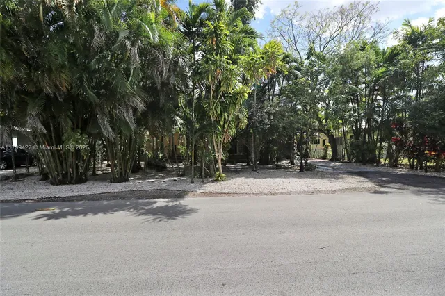 a view of a balcony with chairs