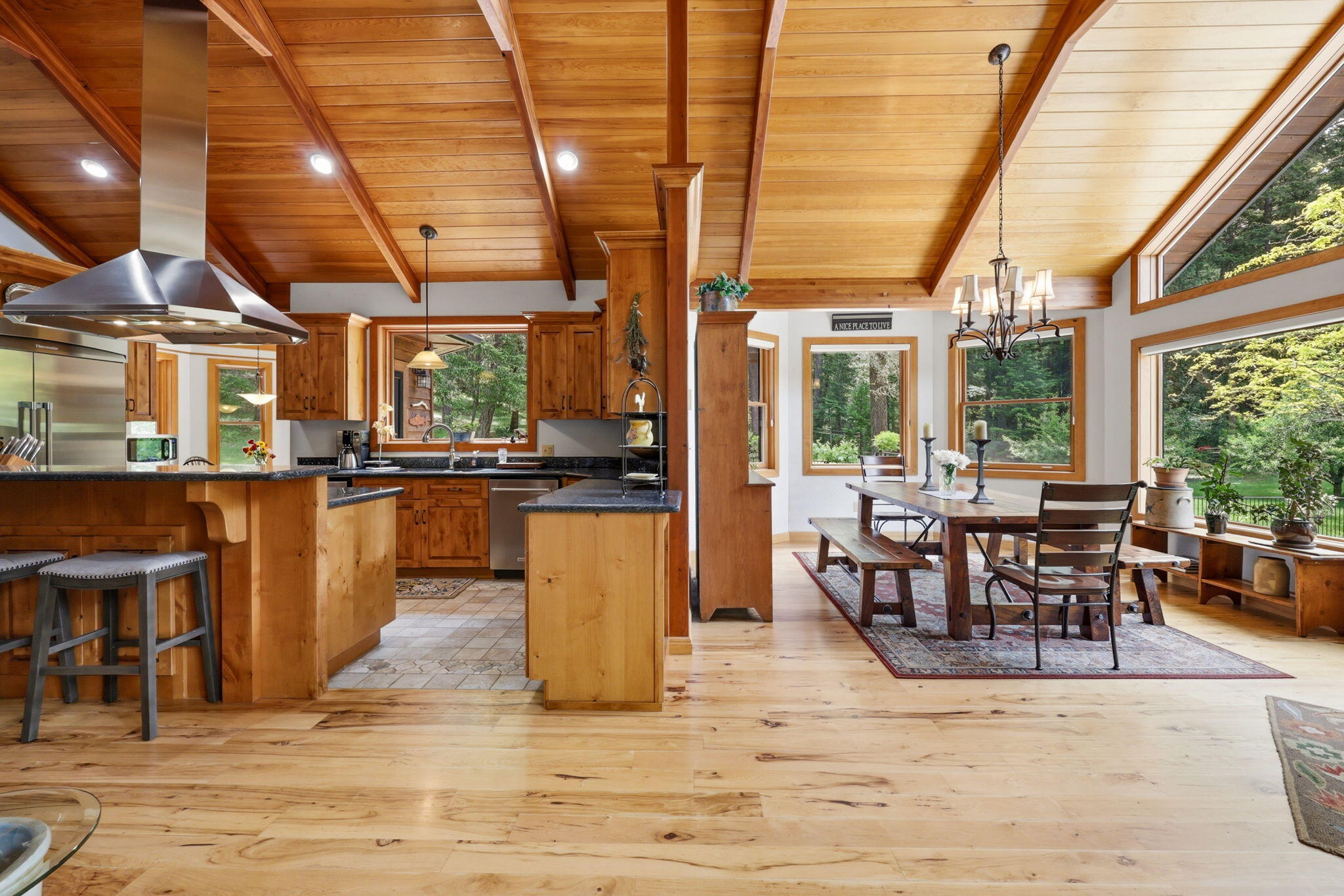 985 Elliott Creek Road Wilderville, OR 97543 - Photo 12 of 98 a view of a dining room with furniture window and outside view