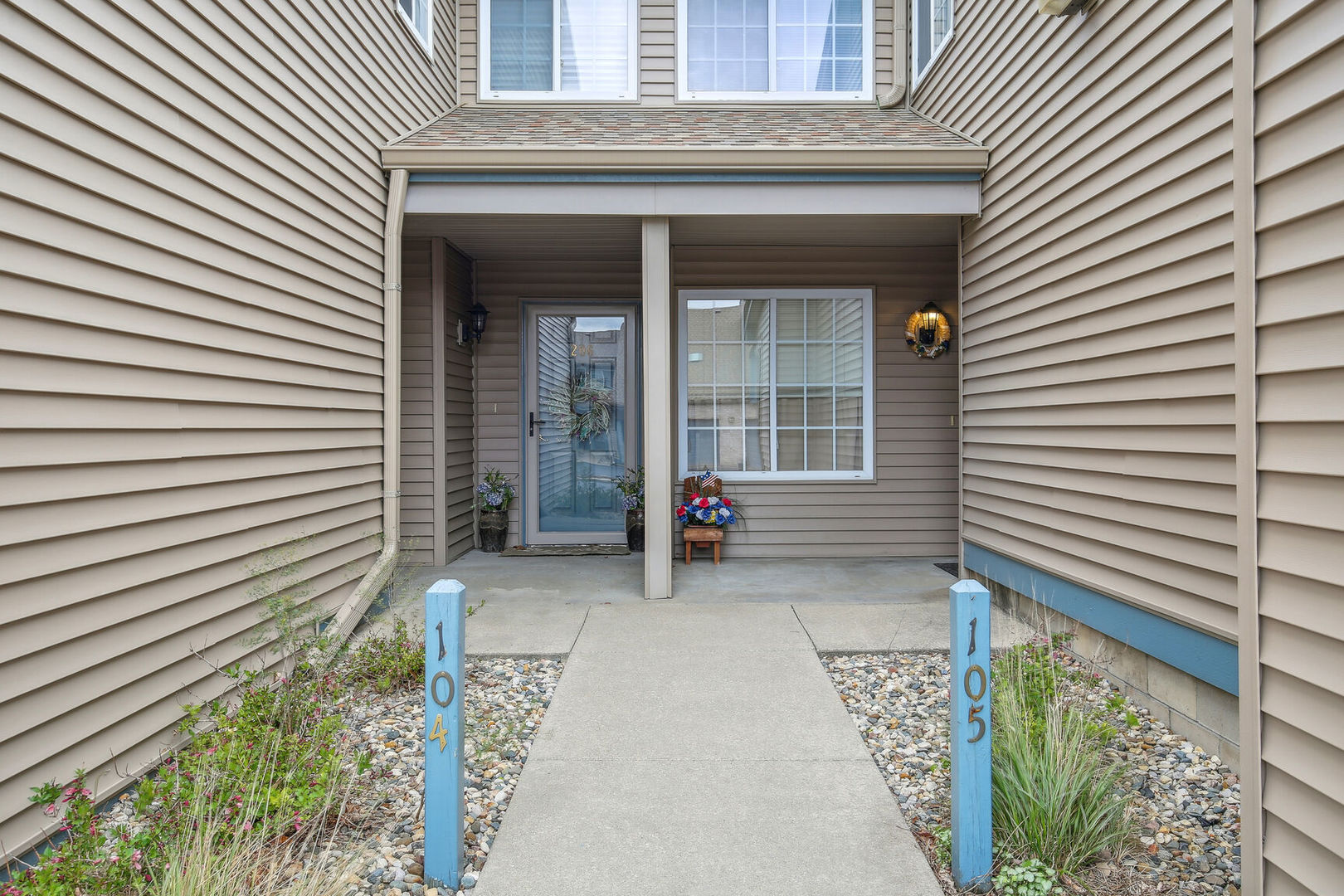 2404 Windward Boulevard, Unit 104 Champaign, IL 61821 - Photo 3 of 14 a view of entrance of the house
