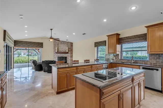 a bedroom with a bed and large mirror