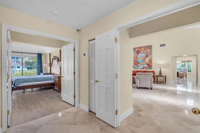 a bathroom with a glass shower door