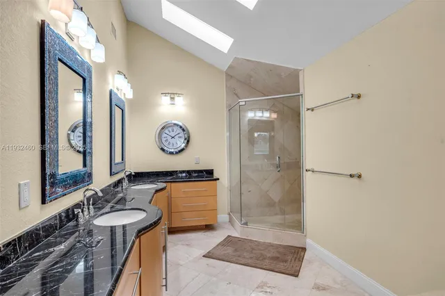 a bed room with a bed and a tv