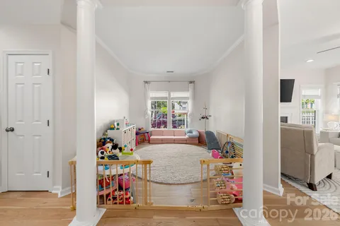 a view of living room with furniture and toys