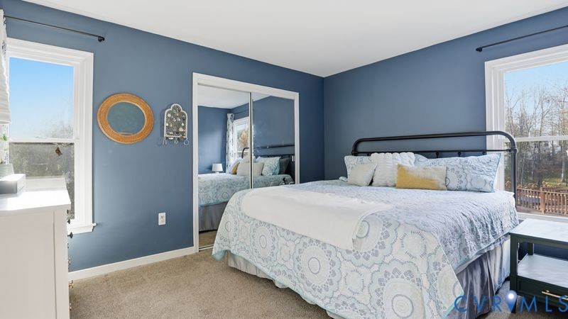 14607 Chatmoss Court Midlothian, VA 23112 - Photo 17 of 41 a bedroom with a bed and a window