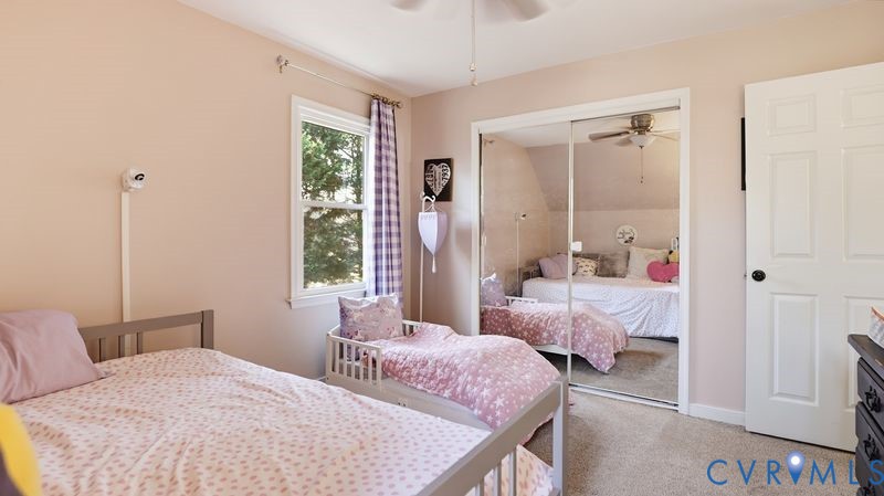 14607 Chatmoss Court Midlothian, VA 23112 - Photo 24 of 41 a bedroom with a bed and a window