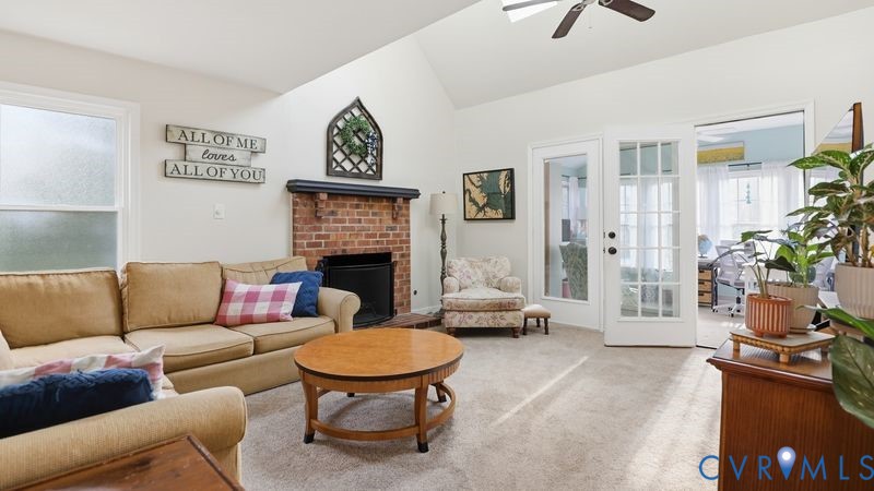 14607 Chatmoss Court Midlothian, VA 23112 - Photo 9 of 41 a living room with furniture and a fireplace