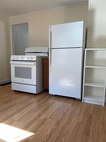 a utility room with washer and dryer
