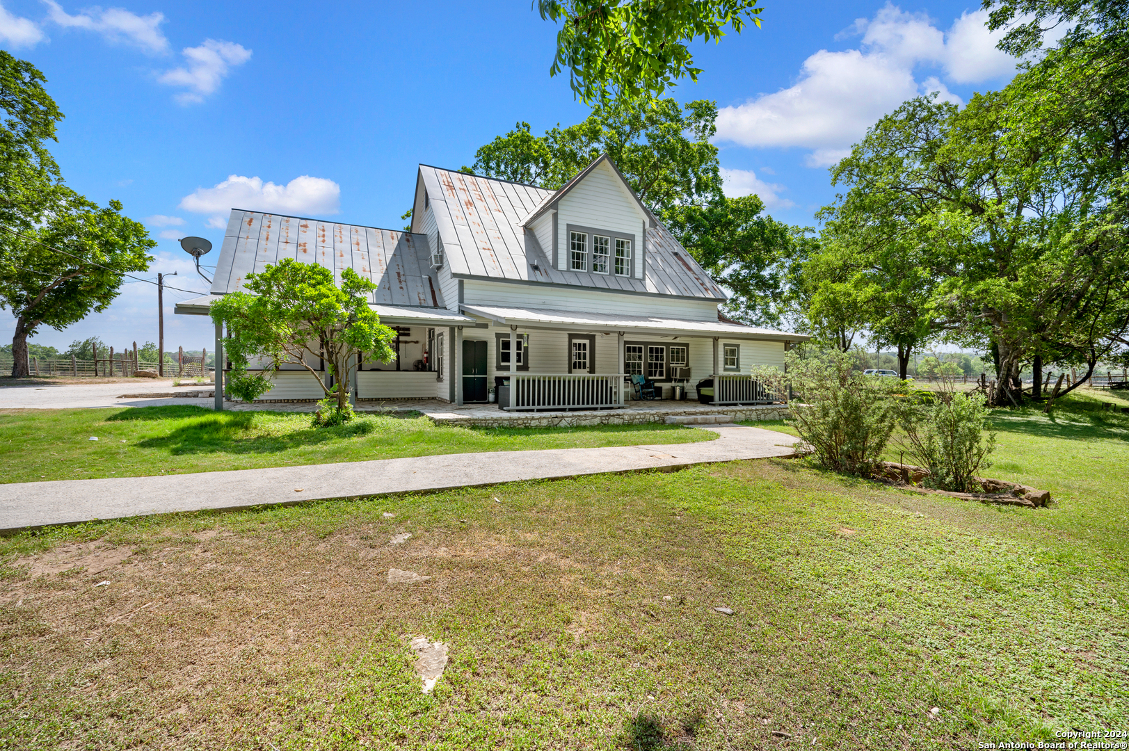109 Waring Welfare Road Boerne, TX 78006 - Photo 8 of 21 a front view of a house with a yard