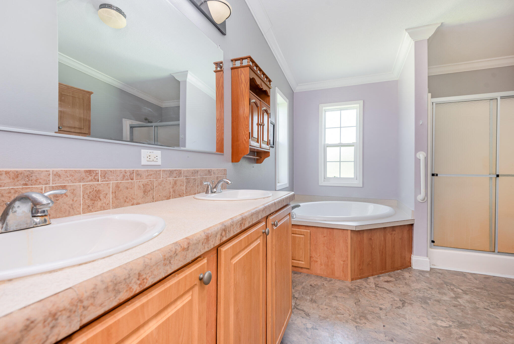 4850 Harrison Road Mims, FL 32754 - Photo 12 of 28 a bathroom with a granite countertop sink and a bathtub