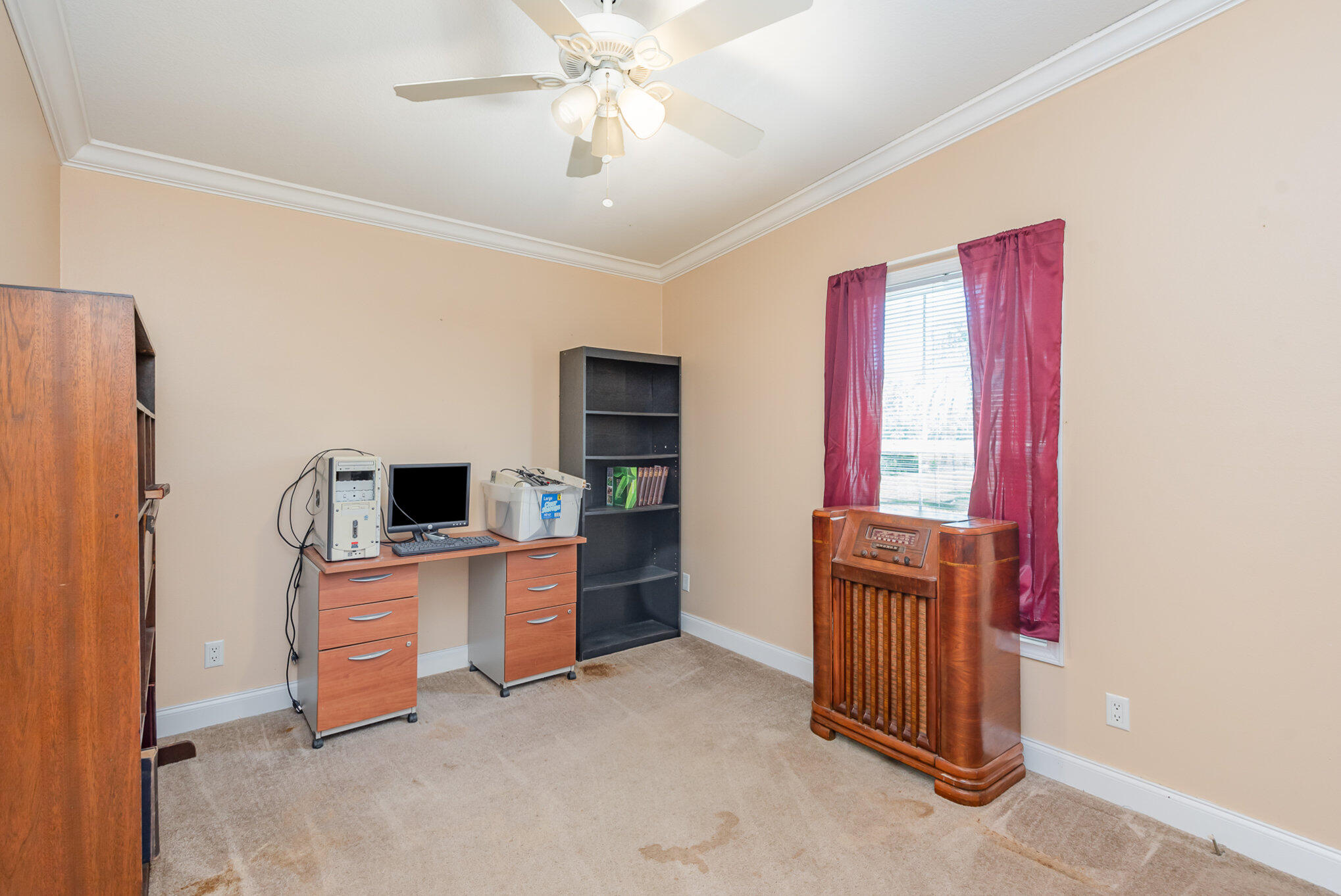 4850 Harrison Road Mims, FL 32754 - Photo 17 of 28 a living room with furniture and a flat screen tv
