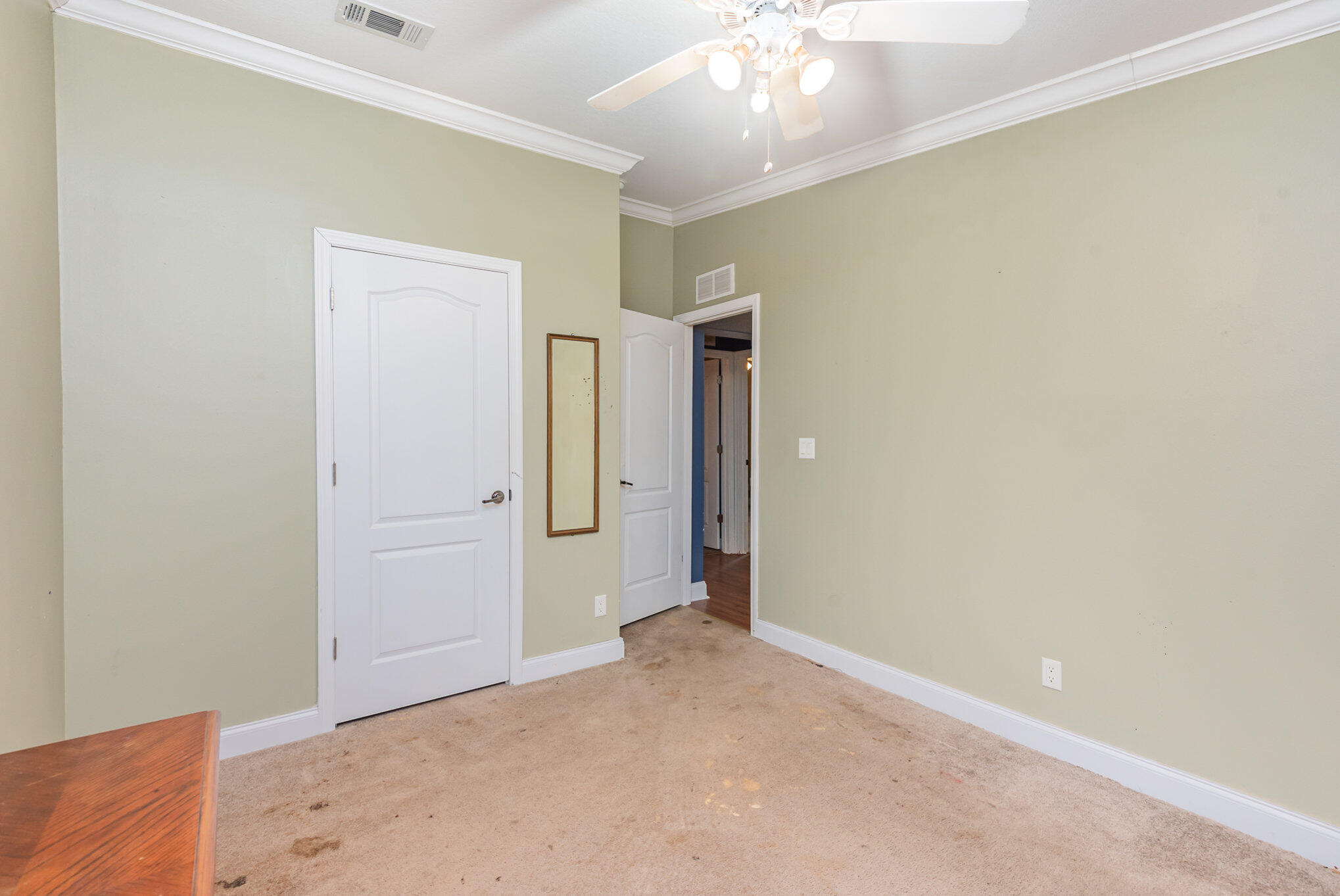 4850 Harrison Road Mims, FL 32754 - Photo 20 of 28 an empty room with chandelier fan