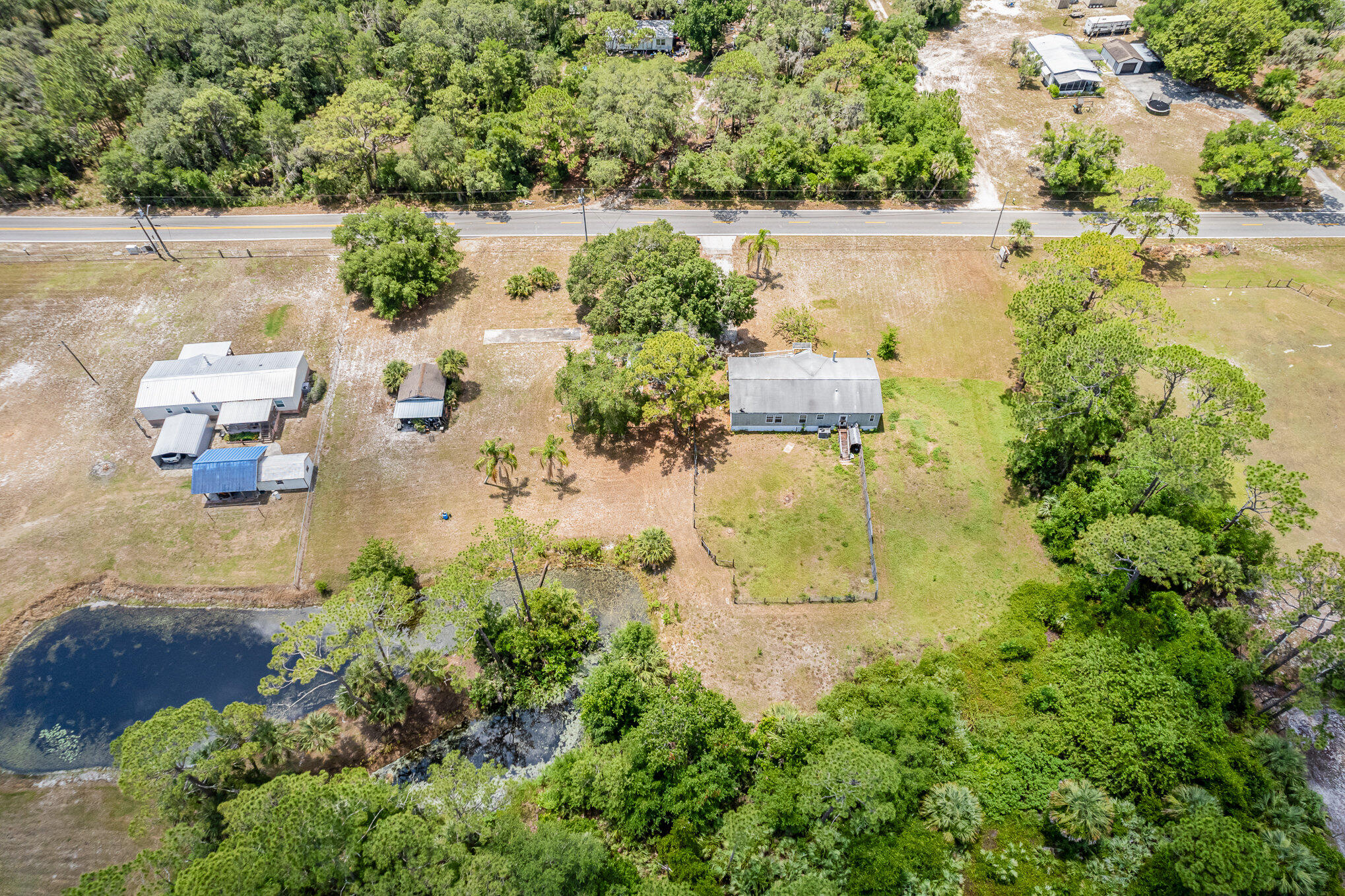 4850 Harrison Road Mims, FL 32754 - Photo 26 of 28 an aerial view of a house with a yard