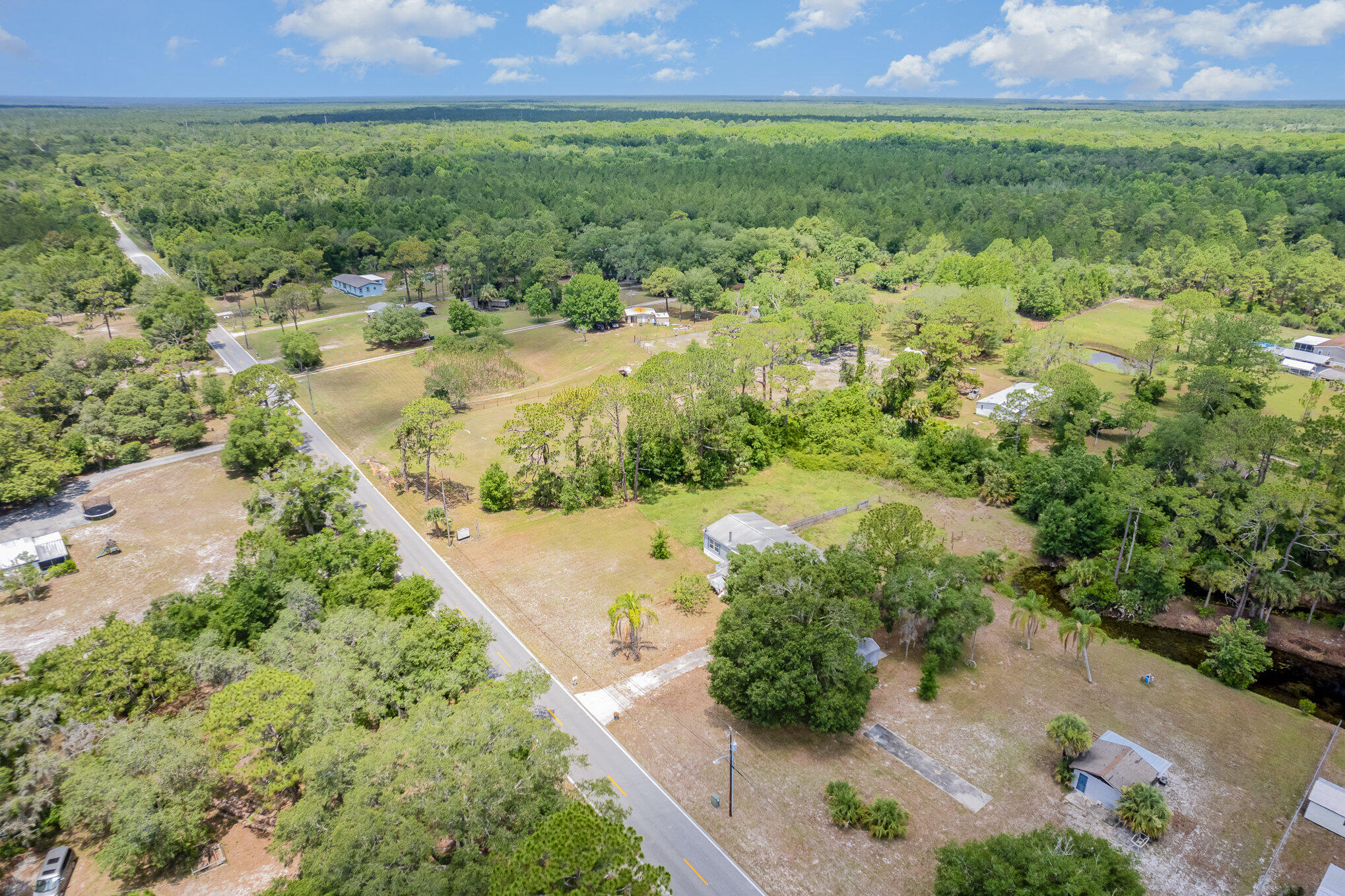 4850 Harrison Road Mims, FL 32754 - Photo 28 of 28 an aerial view of a house