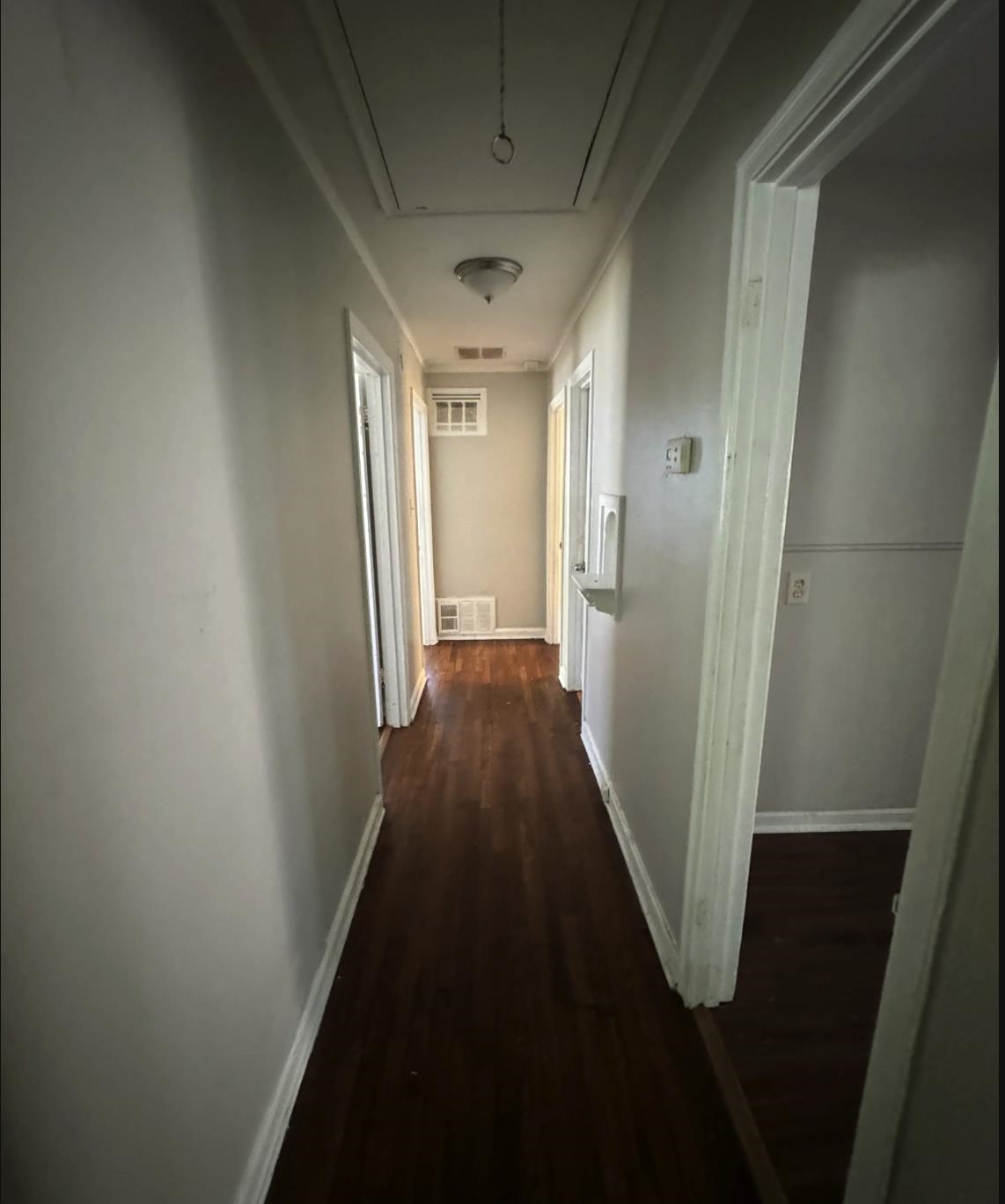 1058 Berclair Road Memphis, TN 38122 - Photo 6 of 8 Hallway with hardwood / wood-style flooring