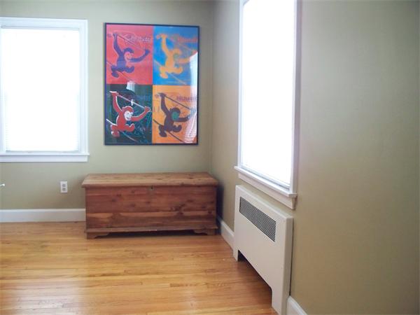 110 Audubon Street Springfield, MA 01108 - Photo 4 of 24 a bathroom with a wooden floor and a window