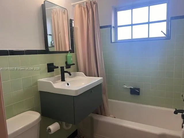 a bathroom with a sink and a bathtub