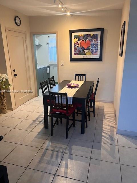 651 Southwest 11th Street, Unit 15W Miami, FL 33129 - Photo 6 of 24 a view of a dining room with furniture