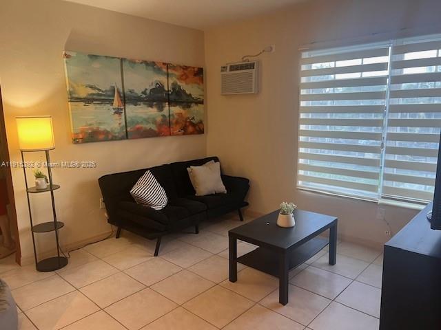 651 Southwest 11th Street, Unit 15W Miami, FL 33129 - Photo 7 of 24 a living room with furniture and a window