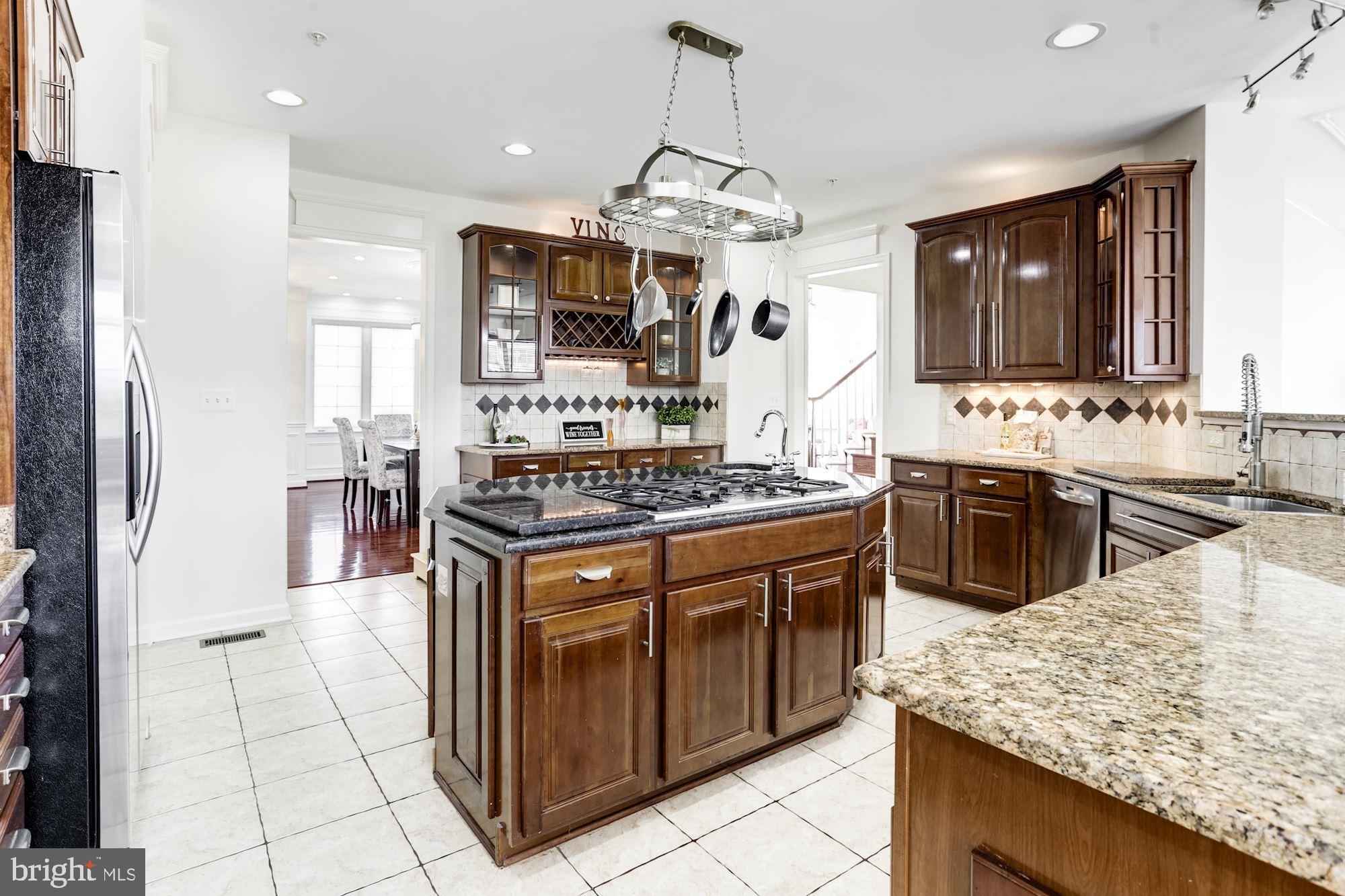 13028 St Clair Road Clarksburg, MD 20871 - Photo 14 of 68 Kitchen island with cooktop