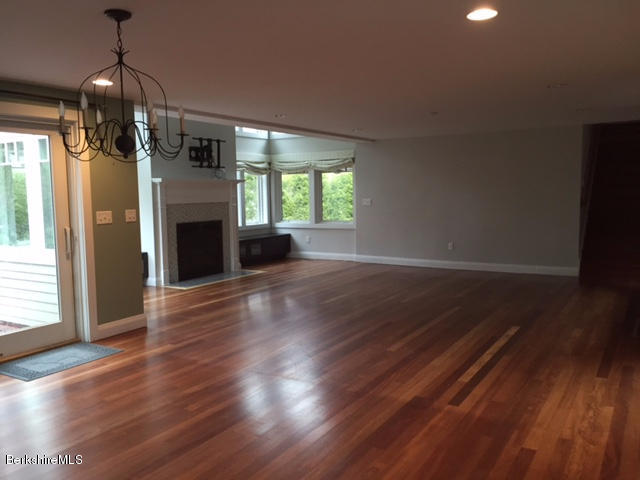 24 Ide Road Williamstown, MA 01267 - Photo 23 of 47 diningroomchandilierlookinglrfireplace