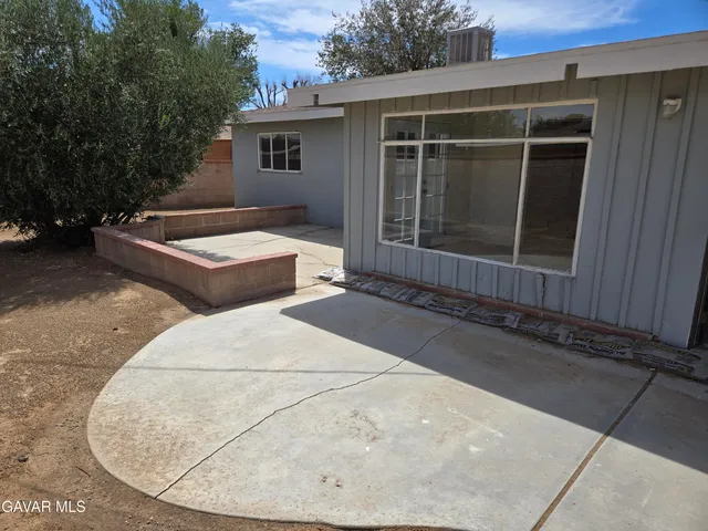 a view of outdoor space and front view of a house