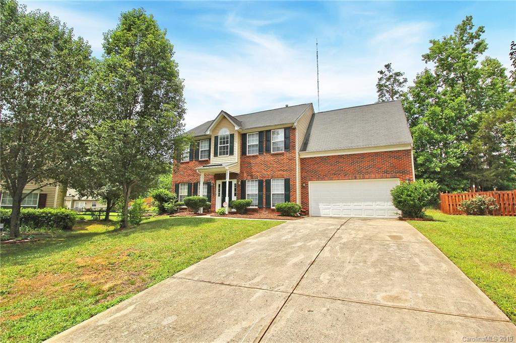 8207 Fox Swamp Road Charlotte, NC 28215 - Photo 2 of 44 a front view of house with yard