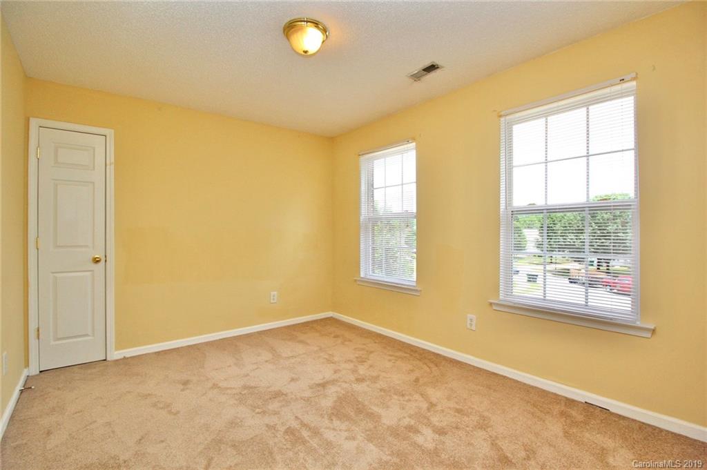 8207 Fox Swamp Road Charlotte, NC 28215 - Photo 29 of 44 a view of an empty room with a window