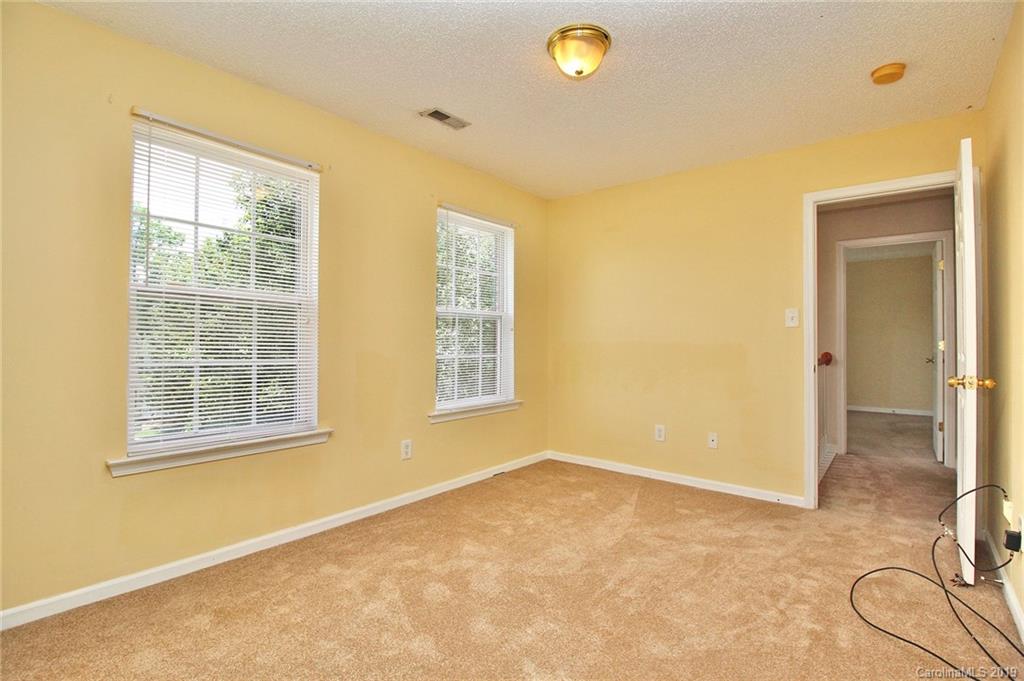 8207 Fox Swamp Road Charlotte, NC 28215 - Photo 30 of 44 a view of an empty room with a window