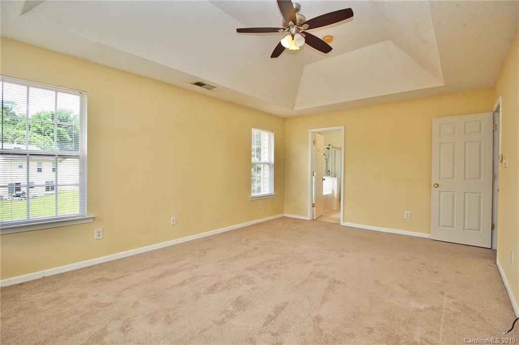 8207 Fox Swamp Road Charlotte, NC 28215 - Photo 34 of 44 a view of an empty room with a window