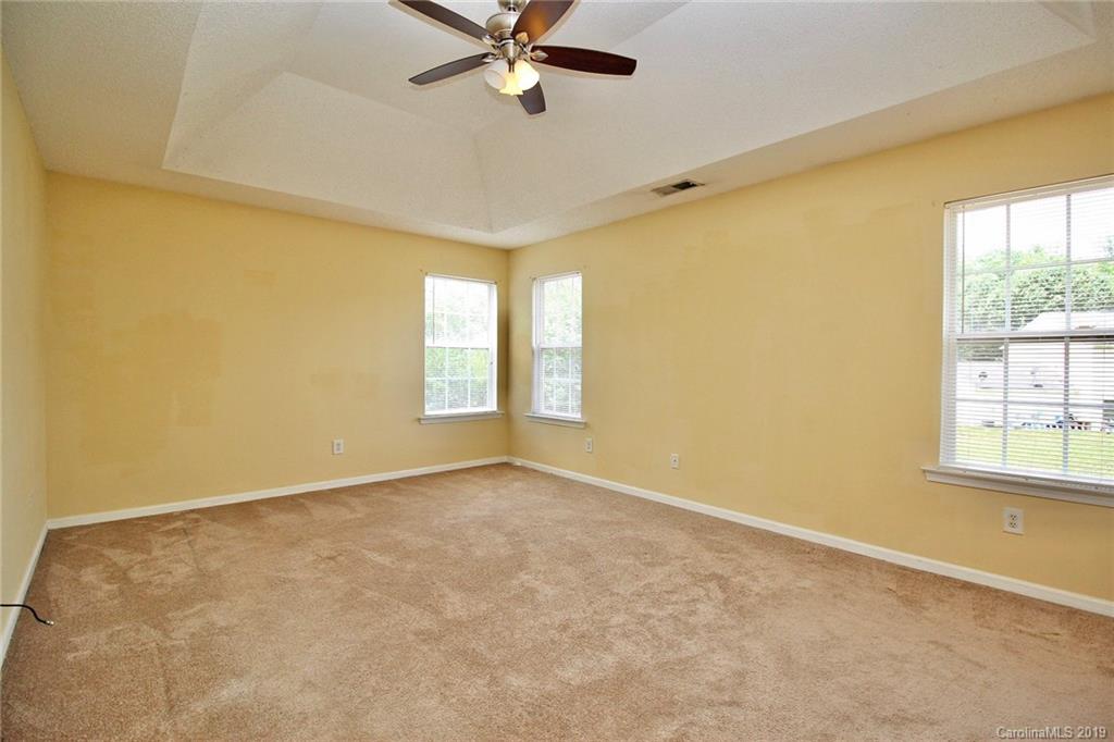 8207 Fox Swamp Road Charlotte, NC 28215 - Photo 35 of 44 a view of an empty room with a window