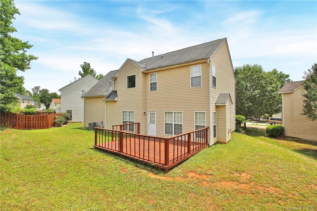 8207 Fox Swamp Road Charlotte, NC 28215 - Photo 38 of 44 a view of a house with a roof deck