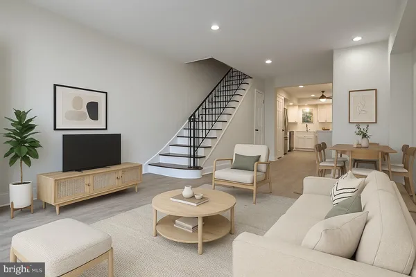 a living room with furniture and a couch
