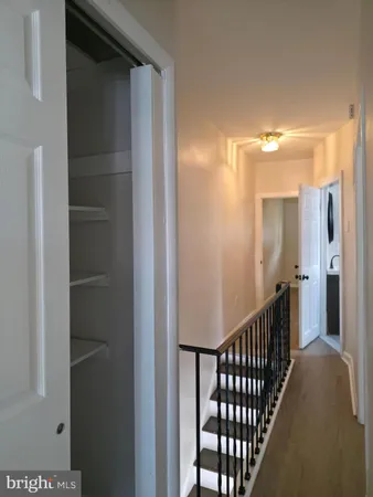 a view of a hallway with entryway