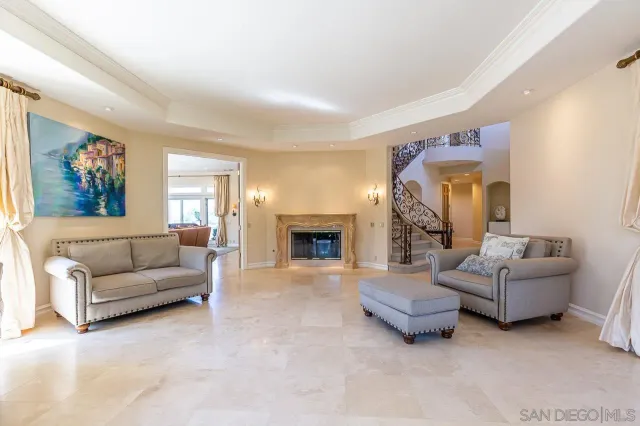 a spacious bedroom with a large bed and a large window