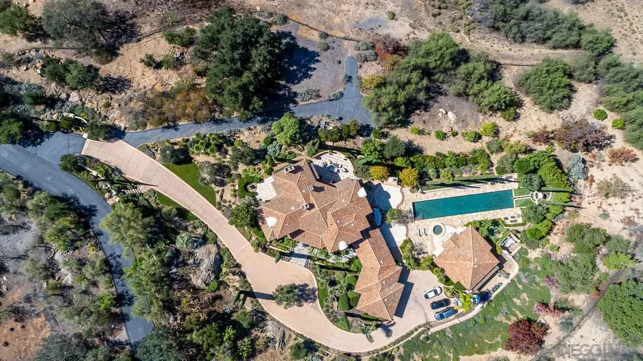 14440 Ridge Ranch Road Valley Center, CA 92082 - Photo 3 of 74 an aerial view of a house with a yard and lake view